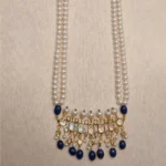 Sha Jewellers Hyderabadi Style Tirmani featuring three pendants with brilliant CZ stones, genuine freshwater pearls, and cascading blue sapphire drops in intricate gold-tone setting - Traditional Nizami jewelry from Hyderabad