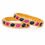 Sha Jewellers 916 Studded 22k Gold Bangles Set of 2 featuring alternating large blue sapphires and vibrant rubies in rhythmic series pattern