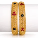 Sha Jewellers 916 Studded 22k Gold Bangles Set of 2 featuring series pattern of three rubies and one blue sapphire repeating around each bangle