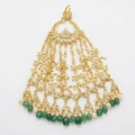 Sha Jewellers Jhumar with CZ, South Sea Pearls and Emeralds - Traditional Indian bridal side headpiece featuring cascading tiers of green emerald stones, lustrous white pearls, and brilliant CZ accents in gold-tone setting