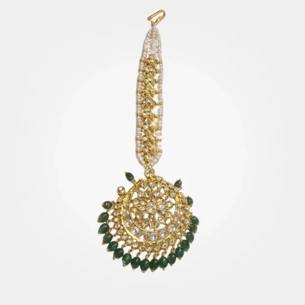 Sha Jewellers Emerald, South Sea Pearl and CZ Maang Teeka - Traditional Indian bridal forehead ornament featuring lush green emeralds, lustrous South Sea pearls, and brilliant CZ stones in intricate gold-tone setting with gracefully dangling forehead pendant