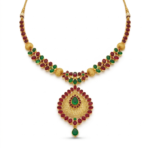 Shah Jewellers 22k Gold Empress Celestial Bloom Necklace featuring ruby and emerald stone accents in radiant floral design