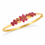 Shah Jewellers 22k Gold Floral Pattern Ruby Bracelet featuring vibrant rubies arranged in intricate repeating flower motifs
