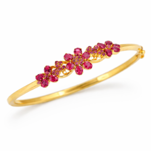 Shah Jewellers 22k Gold Floral Pattern Ruby Bracelet featuring vibrant rubies arranged in intricate repeating flower motifs