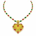 Shah Jewellers 22k Gold Traditional Heart Pendant Necklace featuring ruby red and emerald green gemstone accents