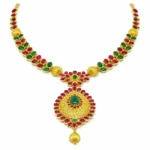 Shah Jewellers Authentic 22K Gold Traditional Medallion Necklace featuring ruby red and emerald green stones in ornate medallion design