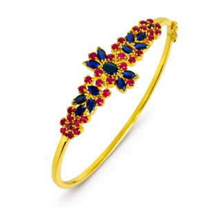 Shah Jewellers 22k Gold Studded Bracelet featuring vibrant rubies, lush emeralds and deep blue sapphires